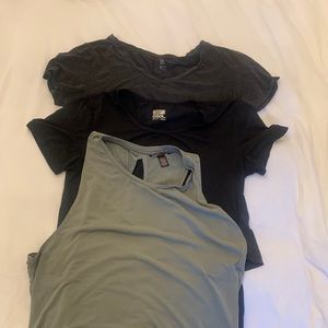 Bundle of workout shirts. 2 short sleeved and 1 sleeveless. Sized M, L and XXL.